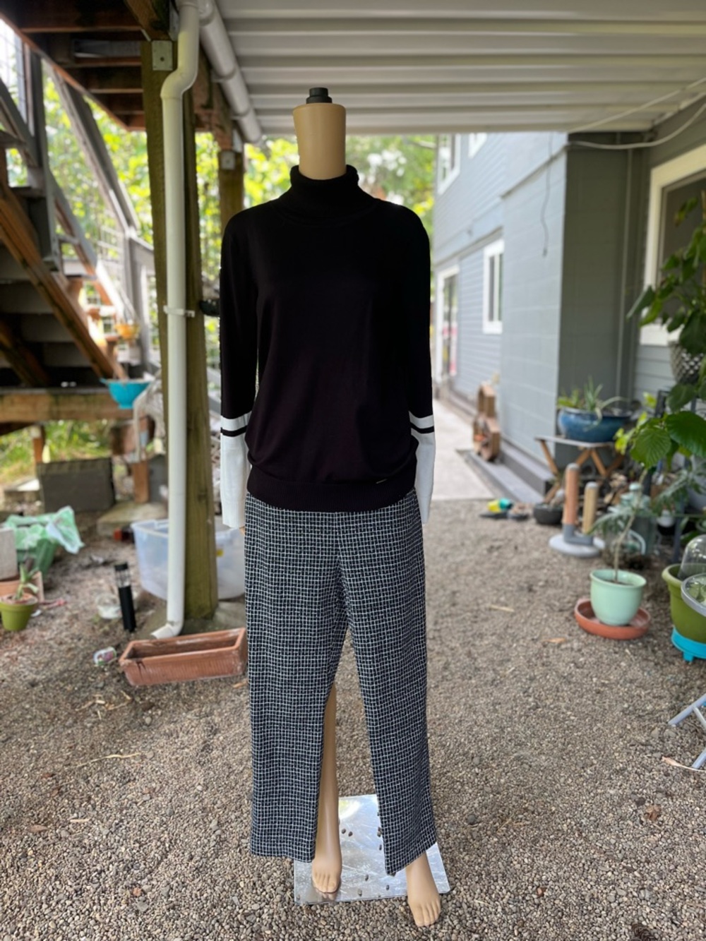 Black Turtleneck Sweater with White Sleeve Accents & Houndstooth Pants